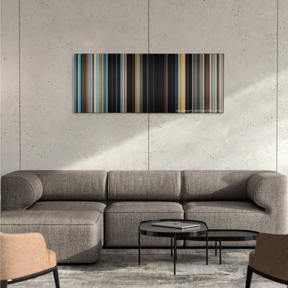 Dirty Harry color palette canvas on a concrete wall above a gray sectional sofa