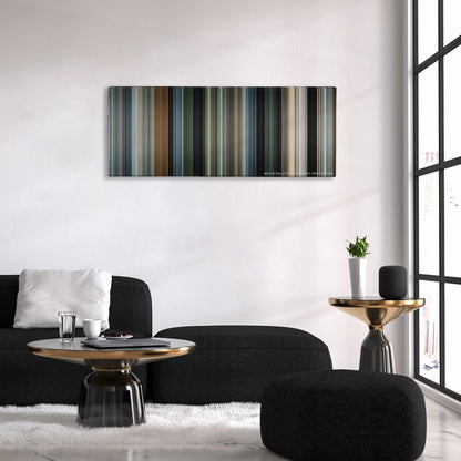 Due Date color palette canvas above a black sofa with a gold-topped table