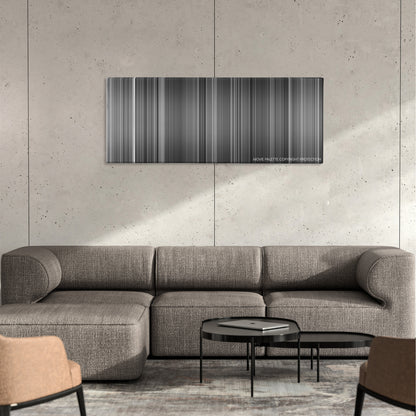 Judgment at Nuremberg color palette canvas on a concrete wall above a gray sectional sofa