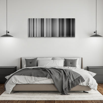 La Haine color palette canvas above a bed, between two black pendant lamps