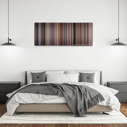 Fatal Attraction color palette canvas above a bed, between two black pendant lamps
