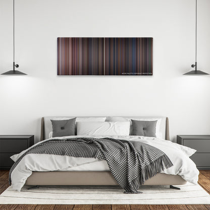 Under Siege color palette canvas above a bed, between two black pendant lamps