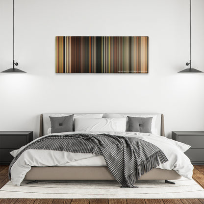 Abduction color palette canvas above a bed, between two black pendant lamps