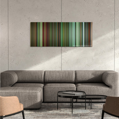 Shoot 'Em Up color palette canvas on a concrete wall above a gray sectional sofa