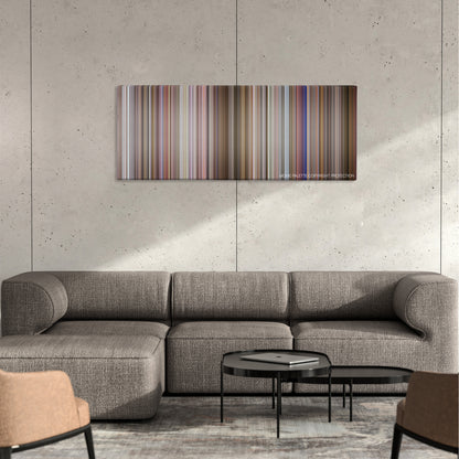 Hera Pheri color palette canvas on a concrete wall above a gray sectional sofa