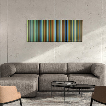 Contagion color palette canvas on a concrete wall above a gray sectional sofa