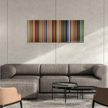 The Virgin Suicides color palette canvas on a concrete wall above a gray sectional sofa