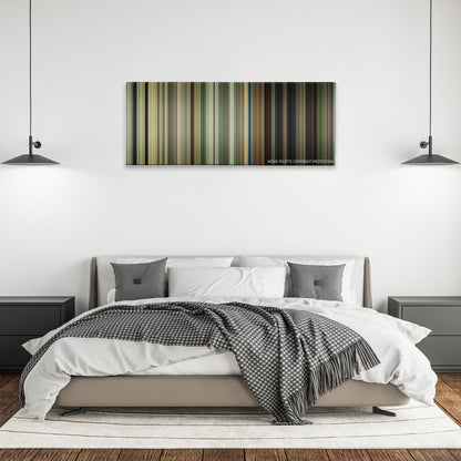 The Highwaymen color palette canvas above a bed, between two black pendant lamps