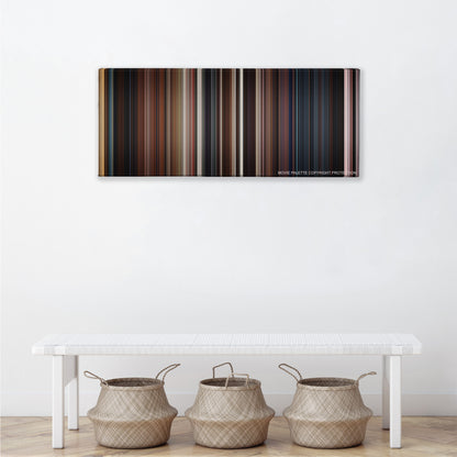 The Wolverine color palette canvas above a white bench with three woven baskets
