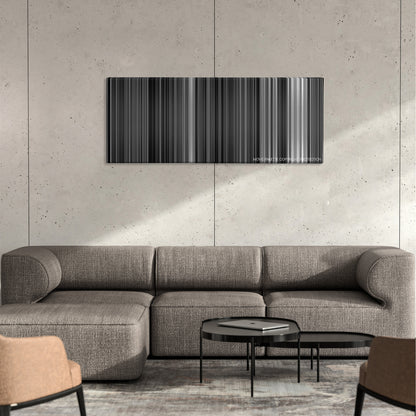 The Passion of Joan of Arc color palette canvas on a concrete wall above a gray sectional sofa