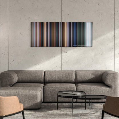 The Chronicles of Narnia: The Voyage of the Dawn Treader color palette canvas on a concrete wall above a gray sectional sofa