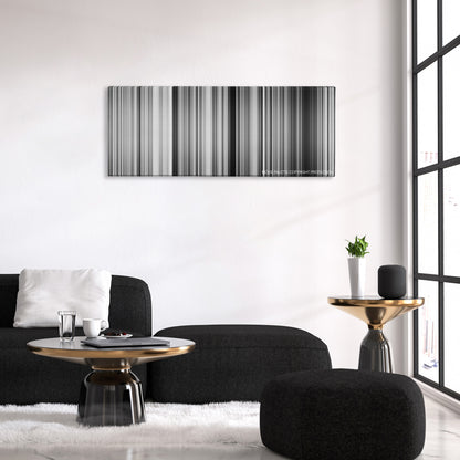 The Battle of Algiers color palette canvas above a black sofa with a gold-topped table