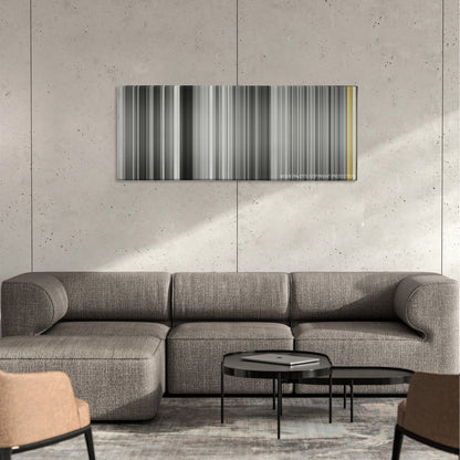 Andrei Rublev color palette canvas on a concrete wall above a gray sectional sofa
