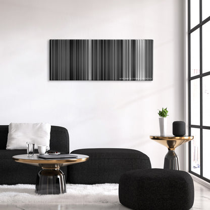 The Passion of Joan of Arc color palette canvas above a black sofa with a gold-topped table