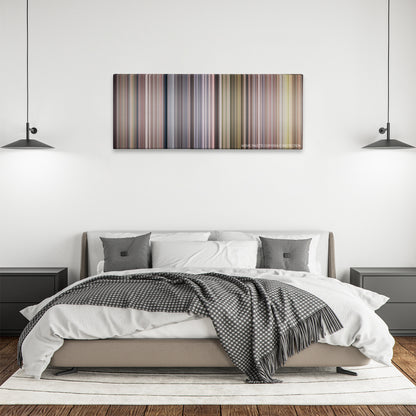Children of Heaven color palette canvas above a bed, between two black pendant lamps