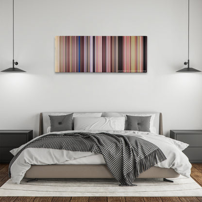 She's the Man color palette canvas above a bed, between two black pendant lamps