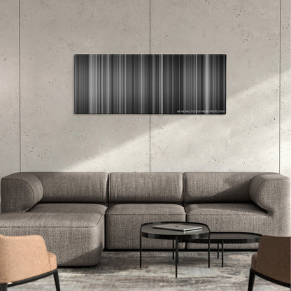 Hara-Kiri color palette canvas on a concrete wall above a gray sectional sofa