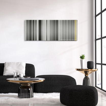 Andrei Rublev color palette canvas above a black sofa with a gold-topped table