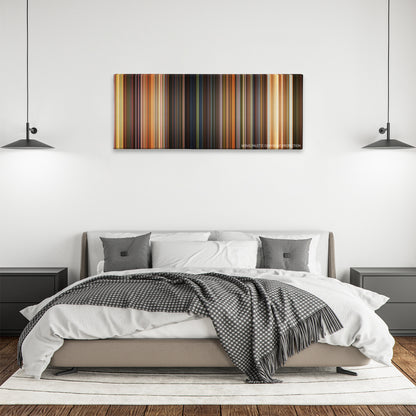 The Bandit color palette canvas above a bed, between two black pendant lamps