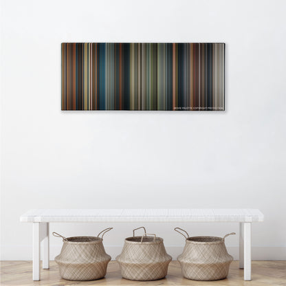 King Kong color palette canvas above a white bench with three woven baskets