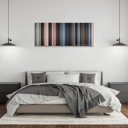 47 Ronin color palette canvas above a bed, between two black pendant lamps