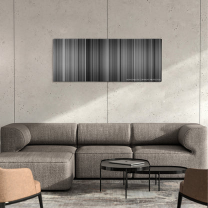 To Be or Not to Be color palette canvas on a concrete wall above a gray sectional sofa