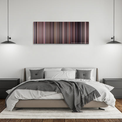 Honey, I Shrunk the Kids color palette canvas above a bed, between two black pendant lamps