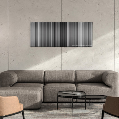 Rififi color palette canvas on a concrete wall above a gray sectional sofa