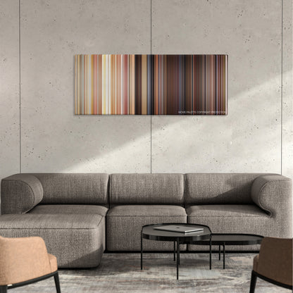 Autumn Sonata color palette canvas on a concrete wall above a gray sectional sofa