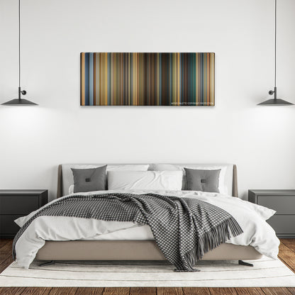 A Good Year color palette canvas above a bed, between two black pendant lamps