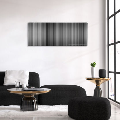 To Be or Not to Be color palette canvas above a black sofa with a gold-topped table