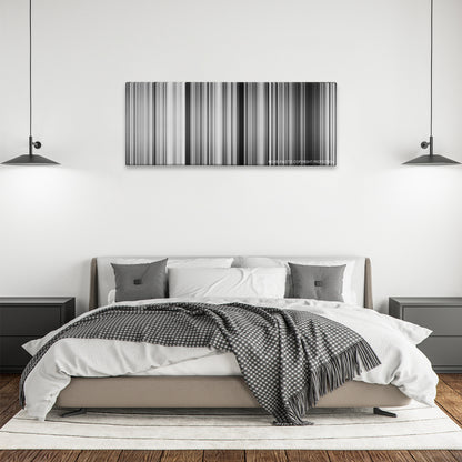 The Battle of Algiers color palette canvas above a bed, between two black pendant lamps