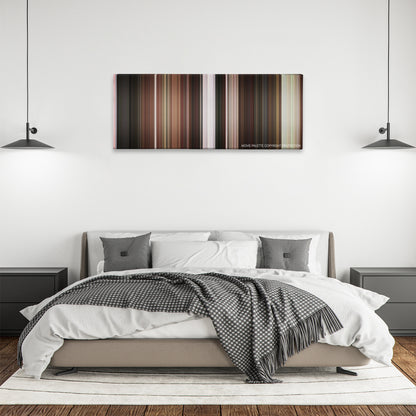 My Fair Lady color palette canvas above a bed, between two black pendant lamps