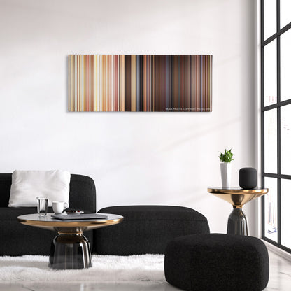 Autumn Sonata color palette canvas above a black sofa with a gold-topped table