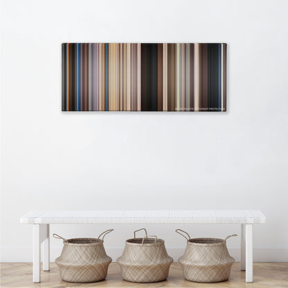 We're the Millers color palette canvas above a white bench with three woven baskets