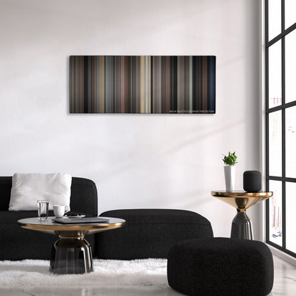 North by Northwest color palette canvas above a black sofa with a gold-topped table