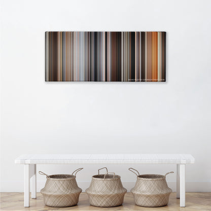 Quantum of Solace color palette canvas above a white bench with three woven baskets