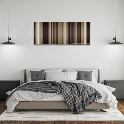 Begin Again color palette canvas above a bed, between two black pendant lamps