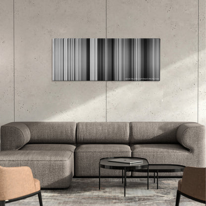 Pather Panchali color palette canvas on a concrete wall above a gray sectional sofa