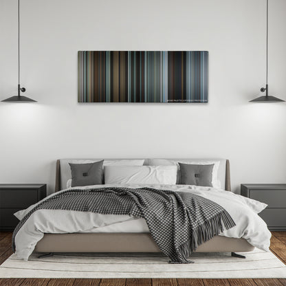 The Gift color palette canvas above a bed, between two black pendant lamps