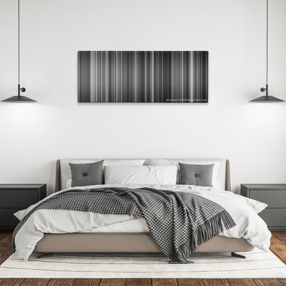 Hara-Kiri color palette canvas above a bed, between two black pendant lamps