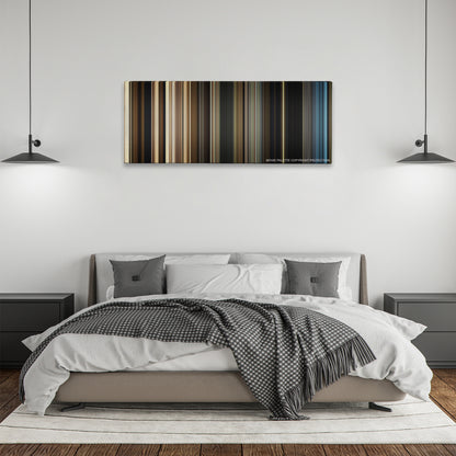 Allied color palette canvas above a bed, between two black pendant lamps