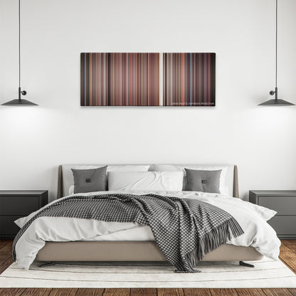 Empire Records color palette canvas above a bed, between two black pendant lamps