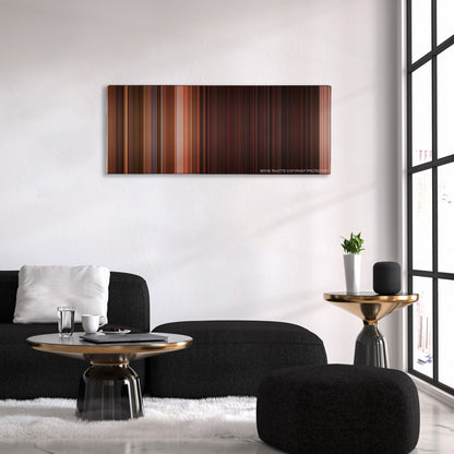 From Dusk Till Dawn color palette canvas above a black sofa with a gold-topped table