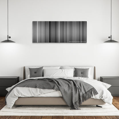 To Be or Not to Be color palette canvas above a bed, between two black pendant lamps