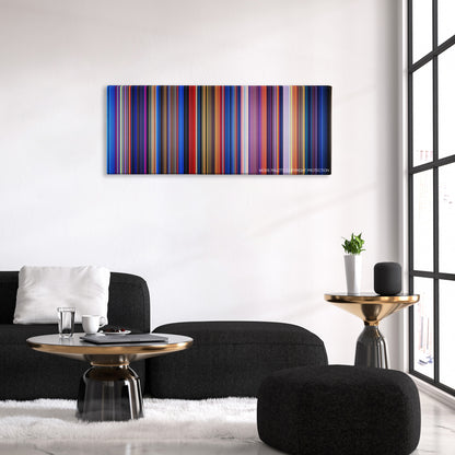Fantasia color palette canvas above a black sofa with a gold-topped table