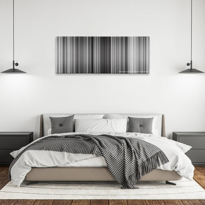 Rififi color palette canvas above a bed, between two black pendant lamps