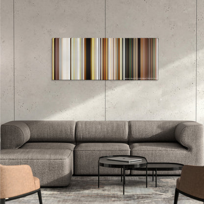 Isle of Dogs color palette canvas on a concrete wall above a gray sectional sofa
