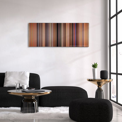 There's Something About Mary color palette canvas above a black sofa with a gold-topped table