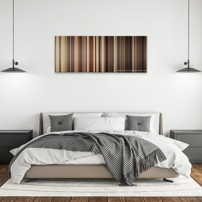 Bewitched color palette canvas above a bed, between two black pendant lamps